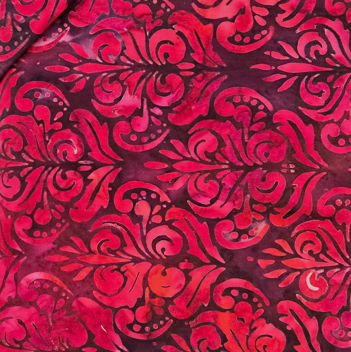 Artisan Batiks - Rosette - Ruby - Medalion on Ruby Red by Lunn Studios