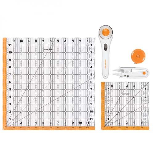 Fiskars - Quilting Essentials-   rulers, rotary cutter, measuring tape, snips