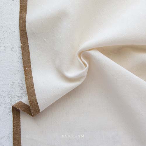 Sprout Woven - Sugar - Cream texture w/a small woven "x"