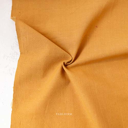 Sprout Woven - Honey - - gold - texture w/a small woven "x"