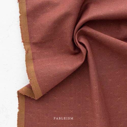 Sprout Woven - Black Cherry - texture w/a small woven "x" - dark rust