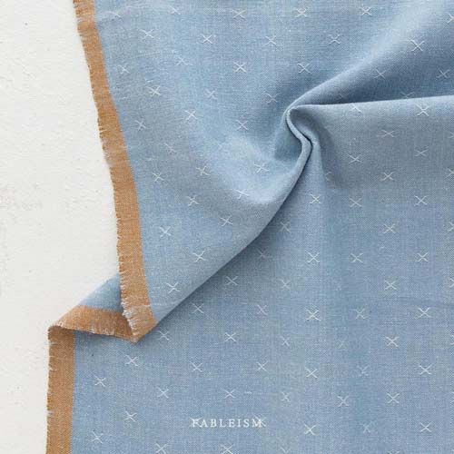 Sprout Woven - Porcelain light blue texture w/a small woven "x"