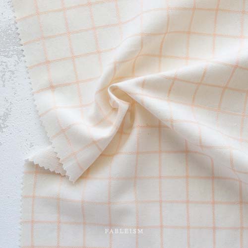 Trellis Woven - Peachy -  Woven peach grid on cream-