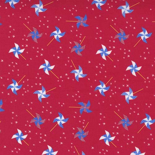 Holiday Americana - Pinwheel - Red - scattered blue and white pinwheels on red