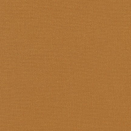 Kona Sheen Solid - Amber Gold- Gold metallic on a medium tan
